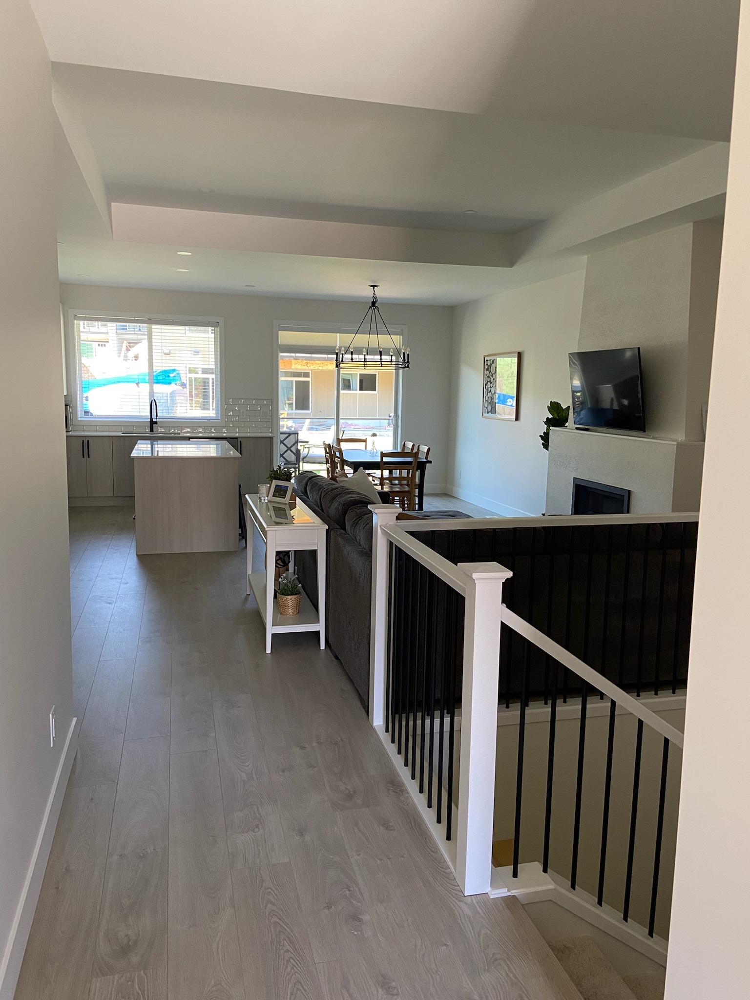 Hallway leading to living/dining/kitchen